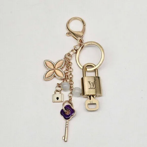 Authentic Louis Vuitton Lock & Key with unbranded Clover Flower Bag Charm 100525 - Picture 2 of 6
